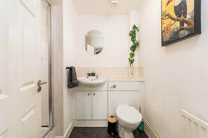 Regadera y secadora de cabello 