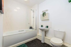 Regadera y secadora de cabello 