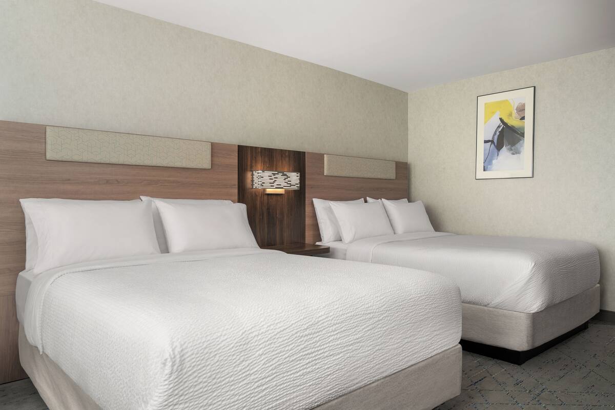 Premium bedding, memory-foam beds, in-room safe, desk