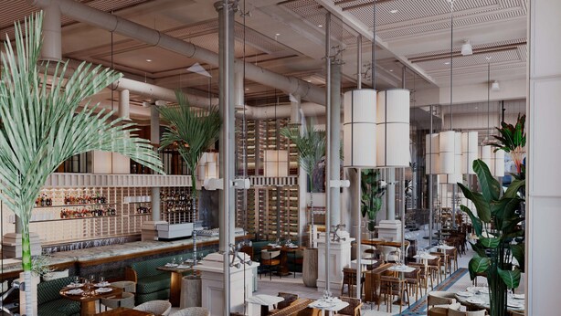 A spacious indoor dining area with high ceilings, exposed ductwork, and a variety of seating arrangements including tables and chairs.