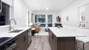 Fridge, dining tables - Landing | Modern 2BD, Gym (Seattle)