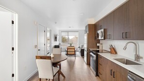 Fridge, dining tables - Landing | Incredible 1BD, Gym (Seattle)