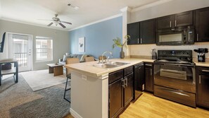 Fridge, dining tables - Landing | Stylish 1BD, Clubhouse (Corpus Christi)