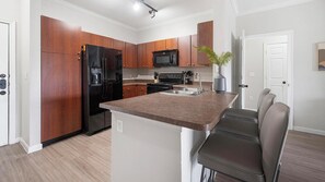 Fridge, dining tables - Landing | Beautiful 2BD, Clubhouse (Corpus Christi)