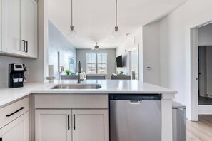 Fridge, dining tables - Landing | Spectacular 1BD, Pool, Game Room (Knoxville)
