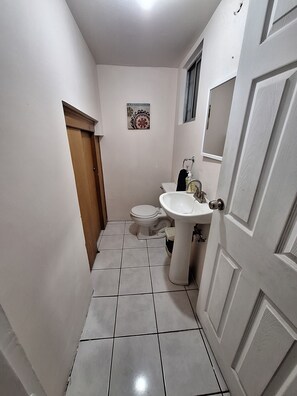 Hair dryer, towels, soap, toilet paper