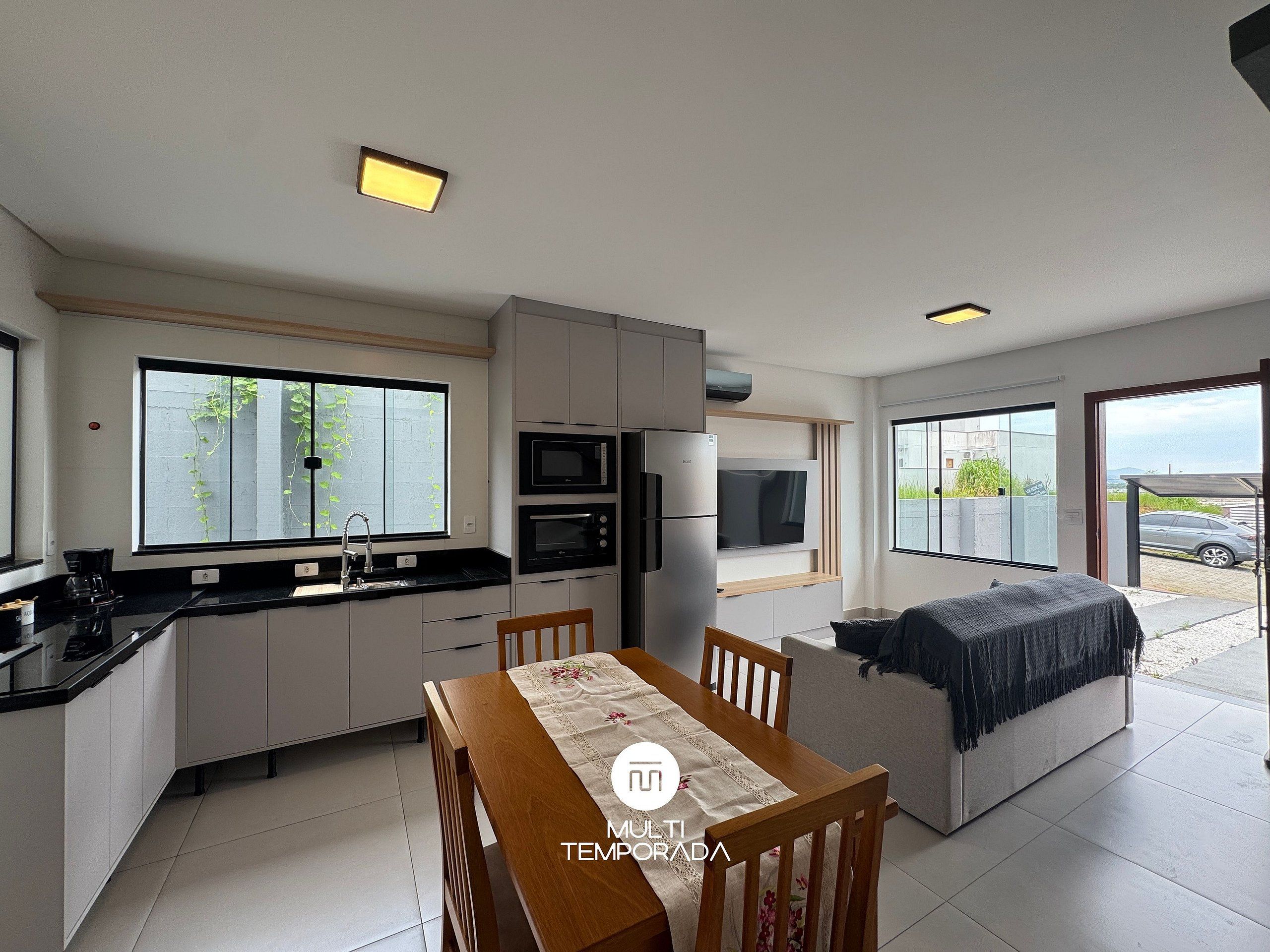 Premium House | Private kitchen | Fridge, microwave, cookware/dishes/utensils, dining table