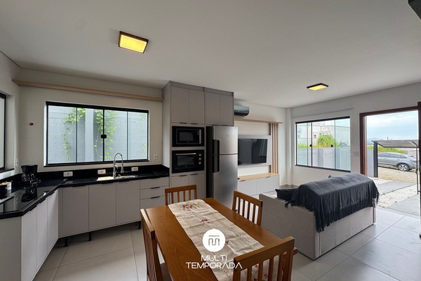 Premium House | Private kitchen | Fridge, microwave, cookware/dishes/utensils, dining table