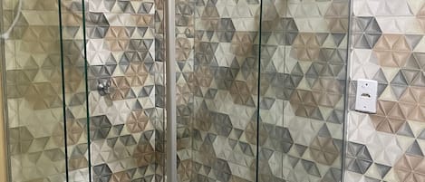 Shower, towels, toilet paper