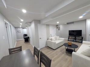 Living area - Brand New 3BR/2BA Basement Apartment near Toronto | Free Parking | Huge Backyard (Mississauga)