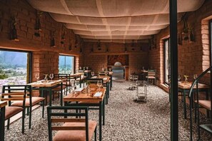 Breakfast, lunch, dinner served; vegan cuisine, garden views 