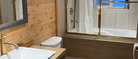 Jetted bath, hair dryer, towels, soap