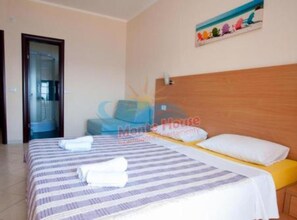 Tabla de planchar con plancha, Internet, ropa de cama