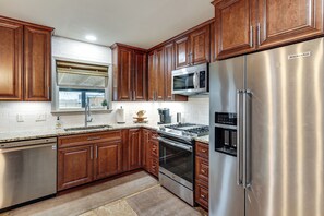 Fridge, microwave, stovetop, dishwasher - Private Patio & Yard: Pet-Friendly Bulverde Home (Bulverde)