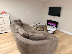 TV, fireplace - Cozy Open-Concept Suite (Greater Sudbury)