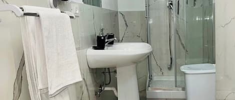 Hair dryer, towels, soap, toilet paper