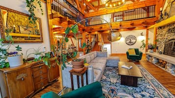 TV connectée, cheminée, lecteur de DVD, baby-foot