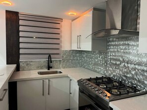 Private kitchen - 3 Bedroom Retreat: Pool, Sports, & Cozy Luxury (Kingston)