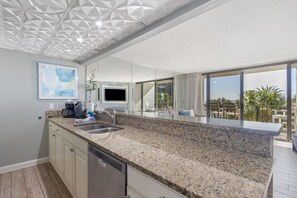 Fridge, microwave, stovetop, coffee/tea maker - Edgewater Beach Resort Tower 1 - 2BR 2BA Condo (Panama City Beach)