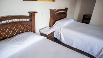 Habitación doble familiar | Wifi gratis y ropa de cama