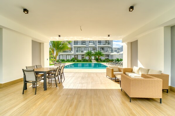 Outdoor dining - Stylish Downtown Apartment 2BR | Prime Location | Walking distance to Nightlife (Punta Cana)
