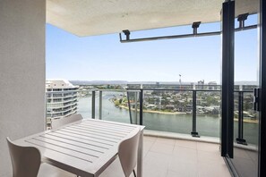 Outdoor dining - 1BRM + Study River View at Circle on Cavill (Gold Coast)