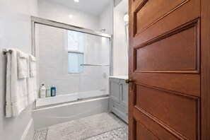 Hair dryer, towels, soap, shampoo