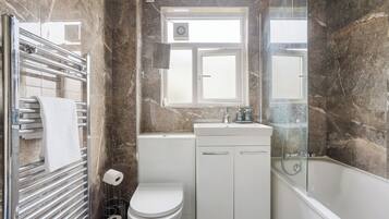 Hair dryer, towels, soap, shampoo