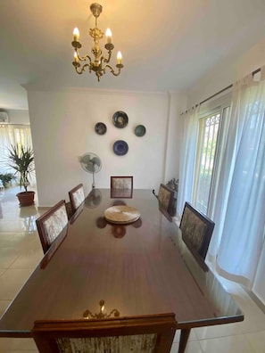 Dining - Spacious 3BR Garden Retreat in Madinaty | Private Patios & A/C (Second New Cairo)