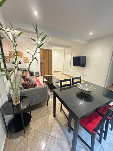 Premium 1BR Heliopolis Suite | Private Garden Terrace & A/C