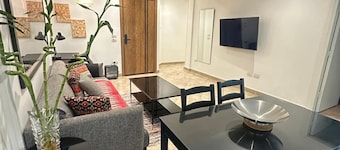 Premium 1BR Heliopolis Suite | Private Garden Terrace & A/C