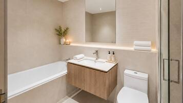 Two Bedroom Apartment | Bathroom | Shower, rainfall showerhead, hair dryer, towels