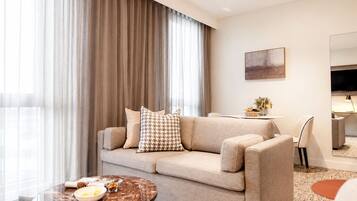 One Bedroom Apartment | Living area | 50-inch Smart TV with digital channels, Netflix, streaming services