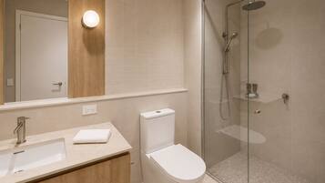 Shower, rainfall showerhead, hair dryer, towels