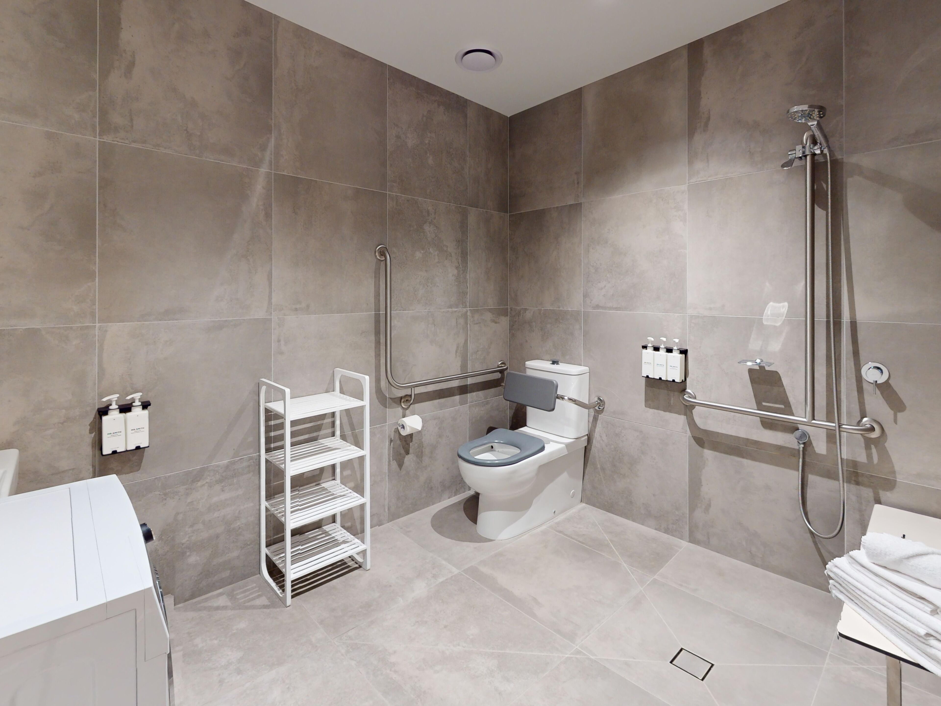 Shower, rainfall showerhead, hair dryer, towels
