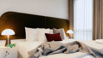 Premium bedding, pillow-top beds, in-room safe, desk