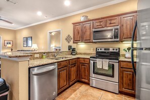 Fridge, microwave, oven, stovetop - Waterfront condo with a pool, central AC, washer/dryer - snowbirds welcome (New Braunfels)