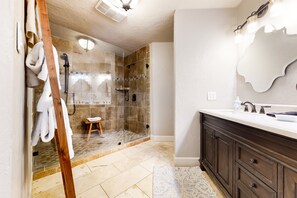 Shower, towels - Spacious dog-friendly home settled on a serene property with wrap-around porch (Wimberley)