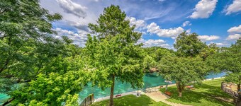 Riverfront condo with pool & hot tub, walk everywhere