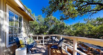 Dog-friendly country cottage with scenic hill views, wrap-around porch, and W/D