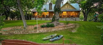 Riverfront home on Lake Seguin with dock, kayaks, beautiful views & air hockey