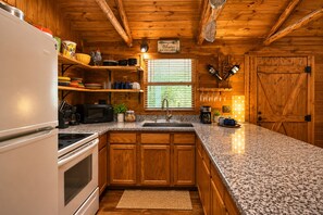 Fridge, microwave, oven, stovetop - Modern Hill Country house & rustic cabin with a private pool and hot tub (Wimberley)