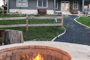 Property grounds - Riverfront family home with large yard, gas grill & outdoor dining area (Wimberley)