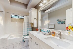 Shower, towels - Quiet, private retreat with lake views, huge covered deck, W/D, & fenced yard (Canyon Lake)