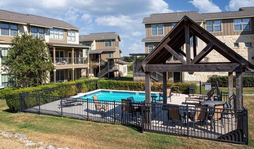 Golf-course getaway with fairway views, pool, WiFi, & central AC