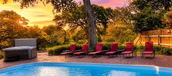 Idyllic waterfront getaway with private hot tub & deck views - near golf
