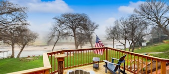 Idyllic waterfront getaway with private hot tub & deck views - near golf