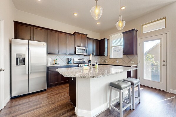 Fridge, microwave, oven, stovetop - Modern townhome with enclosed yard, private balcony, & W/D - near local park (San Antonio)