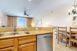 Fridge, microwave, oven, stovetop - Lakefront condo with amazing views, pool, & hot tub - steps from the beach (Orlando)