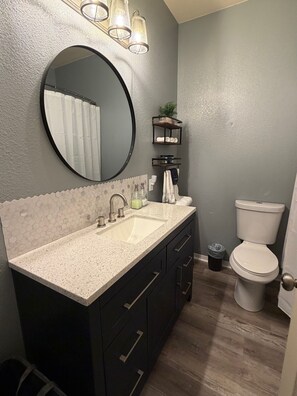 Hair dryer, towels, soap, toilet paper